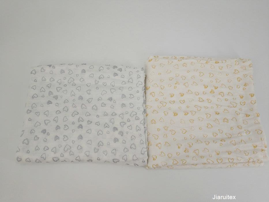 Golden/silver muslin swaddle